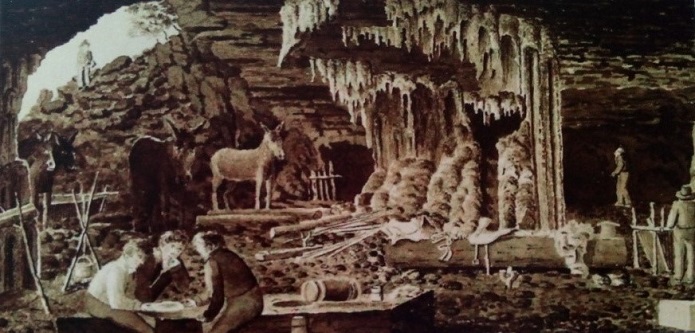 Desenho. Homens trabalhando em uma caverna.